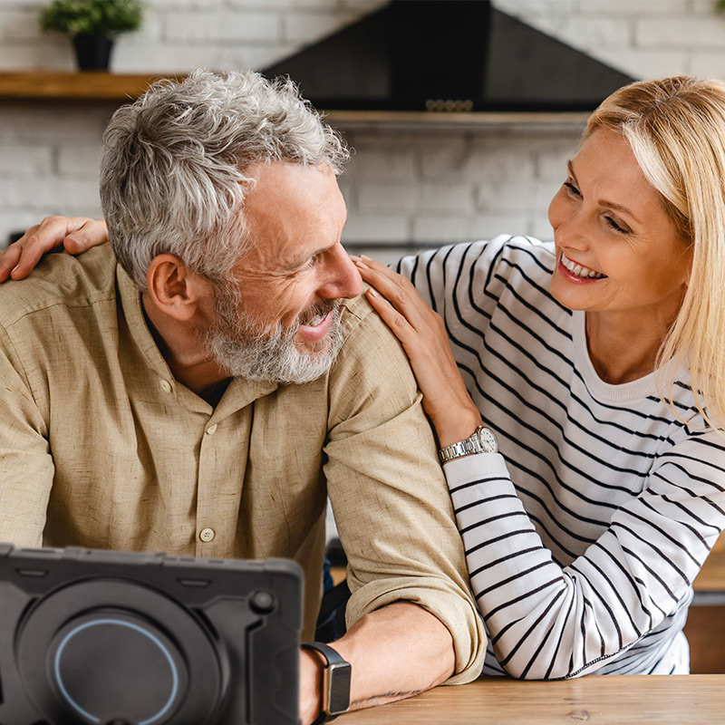 man-woman-using-touchtalk-kitchen